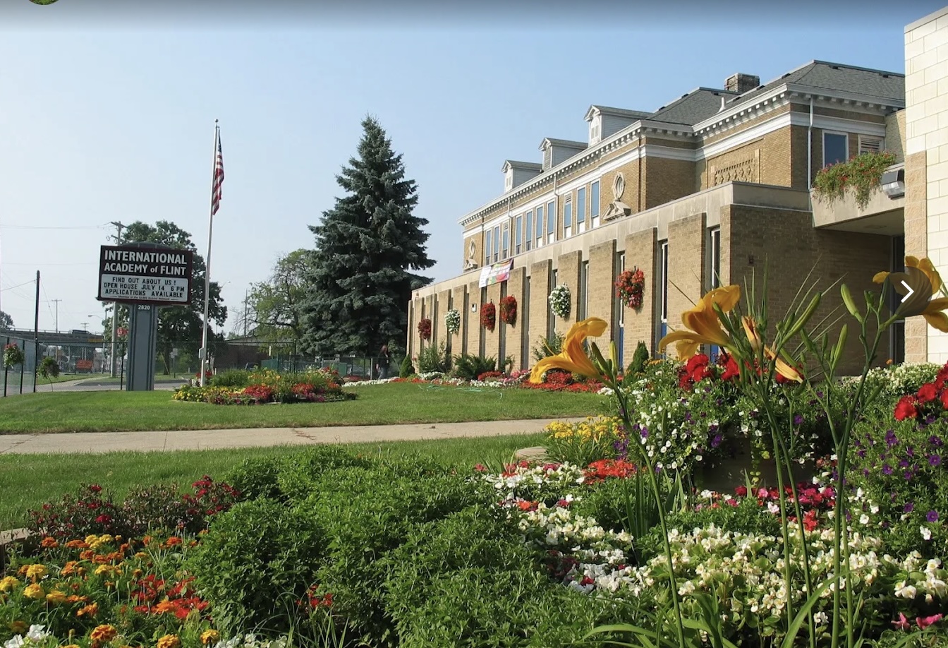 International Academy of Flint school building and grounds in spring